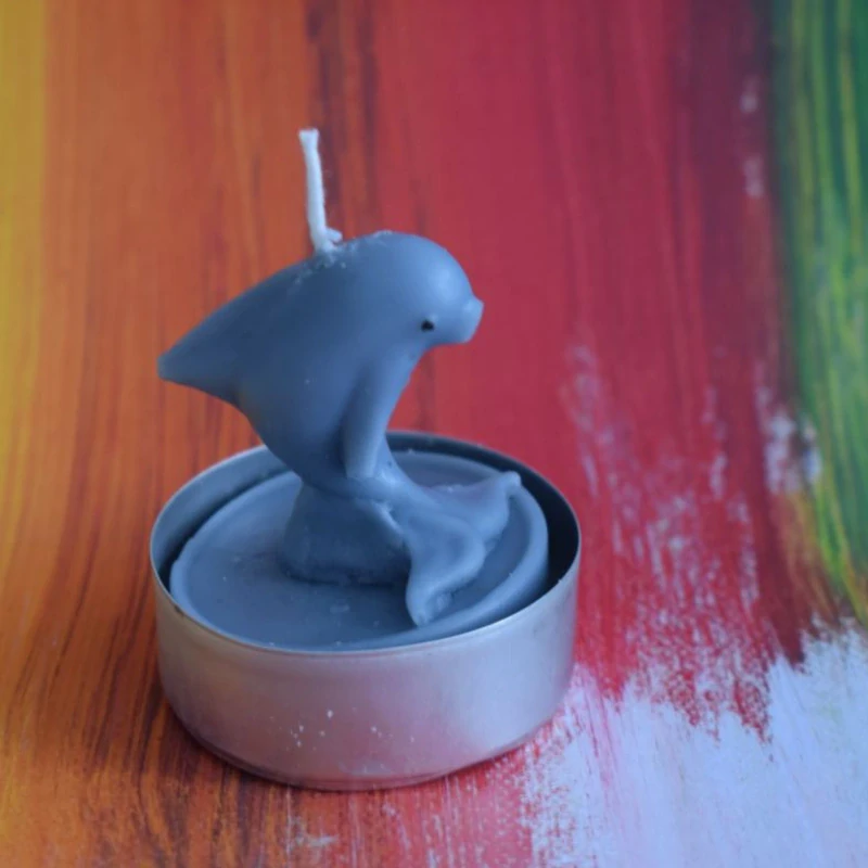 Čajová svíčka - delfín - šedý